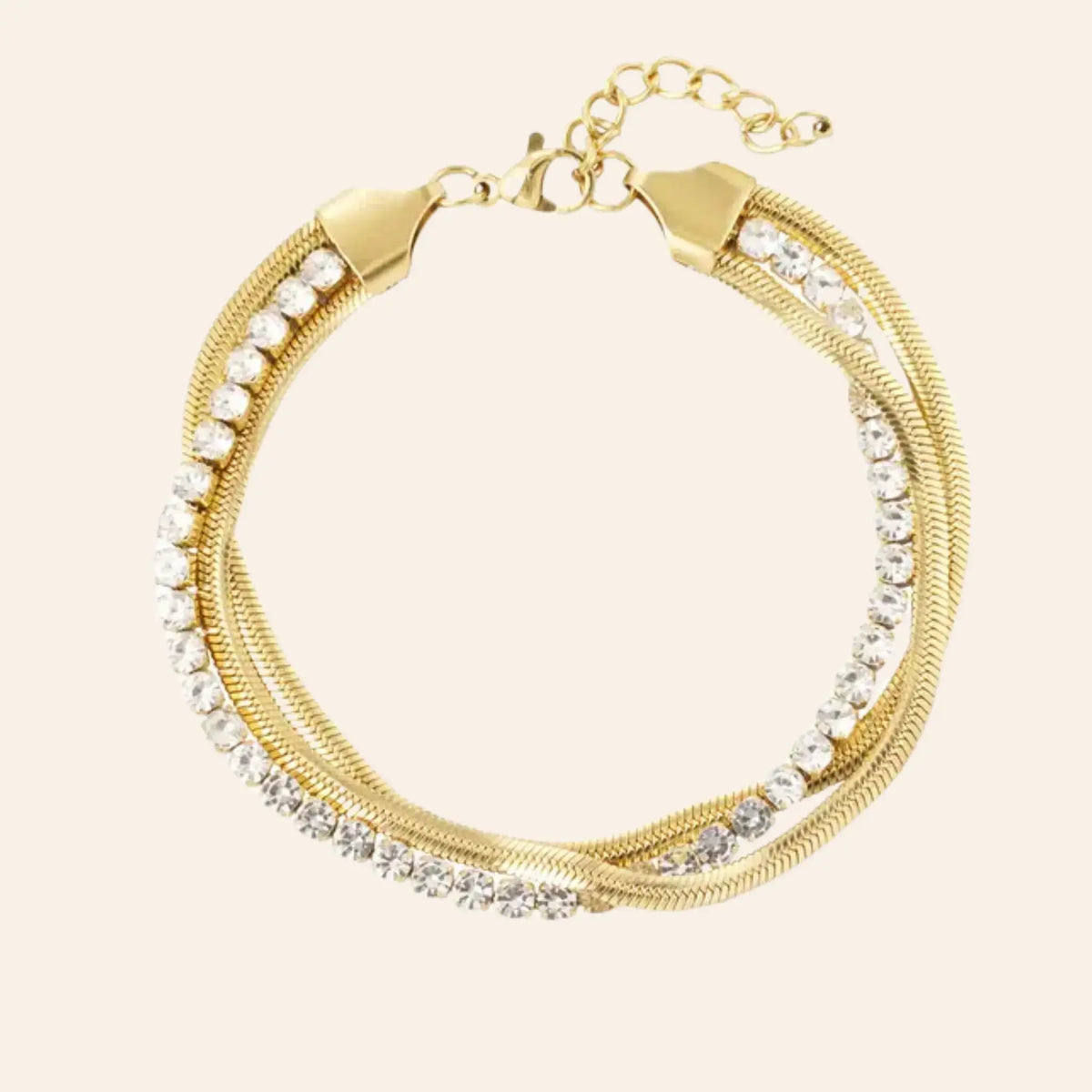 Bracelet Brasilia en acier inoxydable doré, chaîne délicate ornée de cristaux étincelants, présenté seul sur fond neutre.