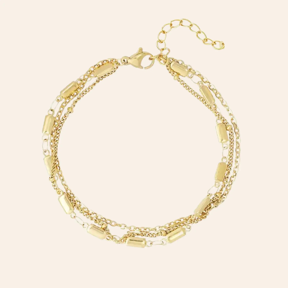 Bracelet Santiago en acier inoxydable doré, chaînes multi-rangs et maillons délicats, design sophistiqué et dynamique, présenté seul sur fond neutre.