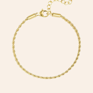 Bracelet Venise en acier inoxydable doré, chaîne torsadée élégante, ajoutant une touche raffinée et discrète, présenté seul sur fond neutre.
